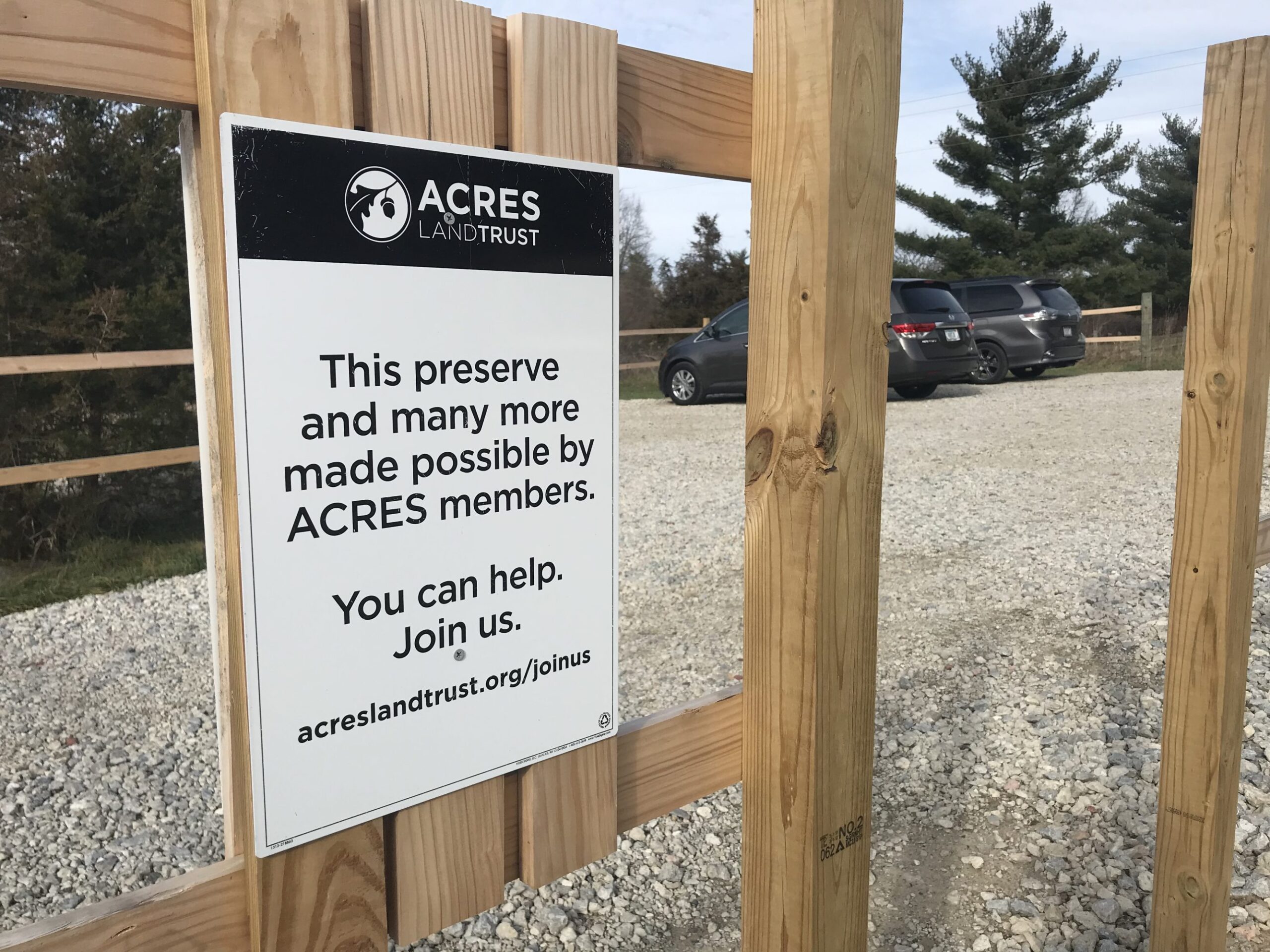 New call to action sign mounted at Tom and Jane Dustin Preserve.